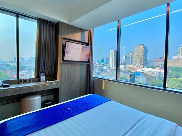 Arthama Tanah Abang Jakarta : photo 10 de la chambre chambre lit king-size deluxe