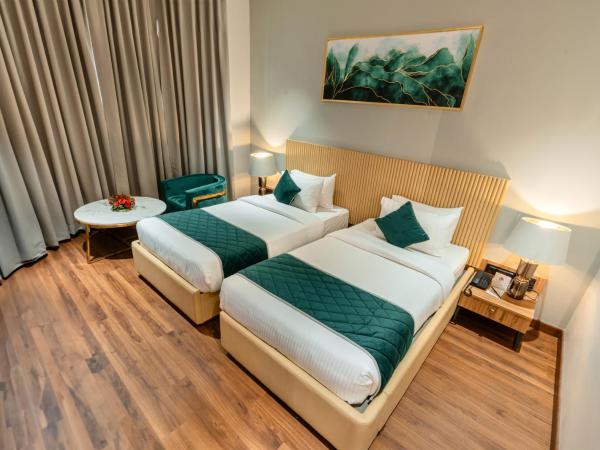 Travancore Court : photo 7 de la chambre chambre lits jumeaux deluxe