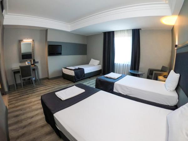 Grand S Hotel : photo 1 de la chambre chambre triple basique