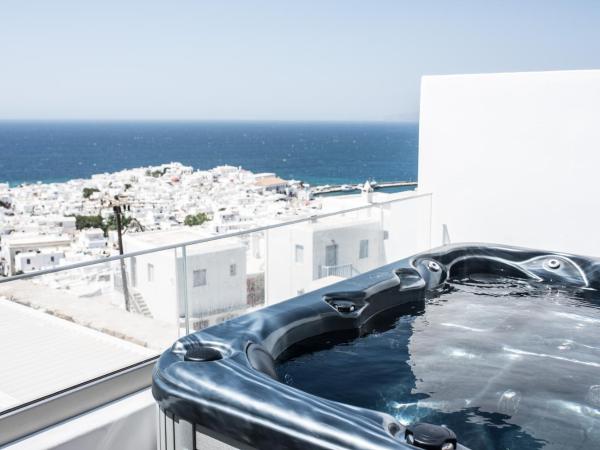 Νumi Boutique Hotel : photo 1 de la chambre suite supérieure avec bain à remous