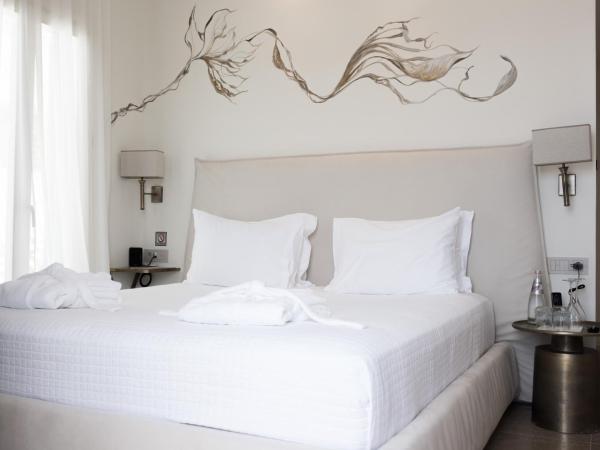 Νumi Boutique Hotel : photo 5 de la chambre suite supérieure avec bain à remous