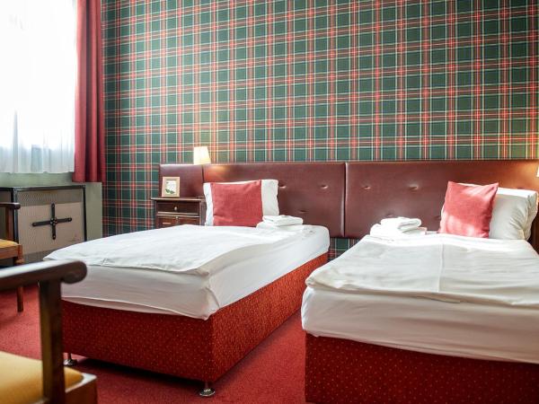 Residence Hattrick : photo 4 de la chambre chambre lits jumeaux