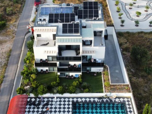 VILLA JANE INN : photo 1 de la chambre chambre double ou lits jumeaux deluxe avec balcon - vue sur mer