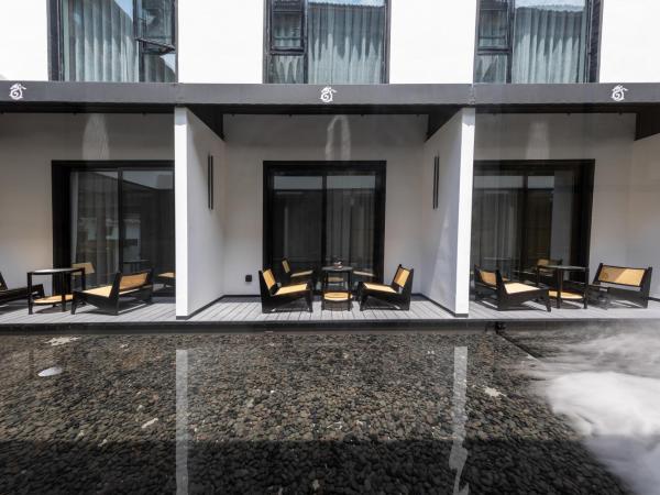 Gongxili - Xige Hotel : photo 6 de la chambre chambre lit king-size deluxe avec vue