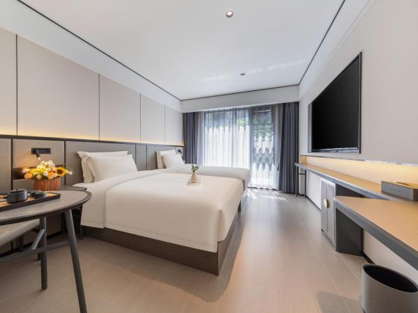 Gongxili - Xige Hotel : photo 3 de la chambre chambre lits jumeaux standard