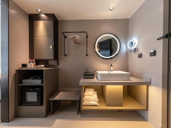 Gongxili - Xige Hotel : photo 5 de la chambre chambre lits jumeaux standard