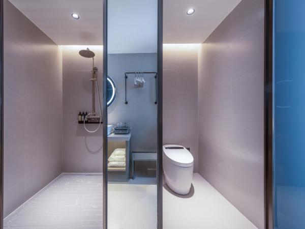 Gongxili - Xige Hotel : photo 4 de la chambre chambre lits jumeaux standard