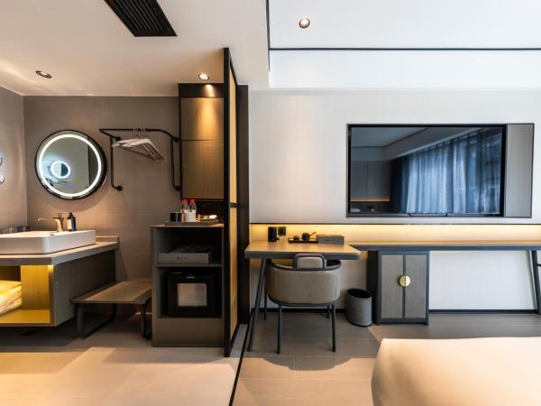 Gongxili - Xige Hotel : photo 2 de la chambre chambre standard lit queen-size