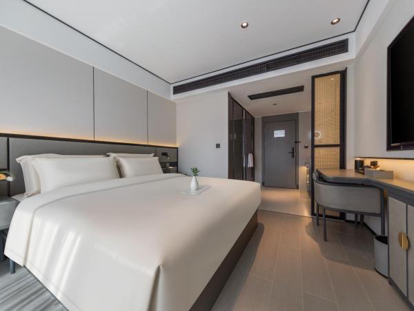 Gongxili - Xige Hotel : photo 3 de la chambre chambre standard lit queen-size