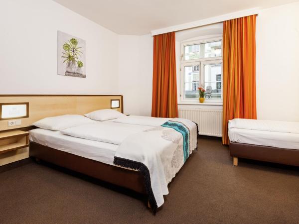 Hotel Goldene Krone Innsbruck : photo 1 de la chambre chambre triple