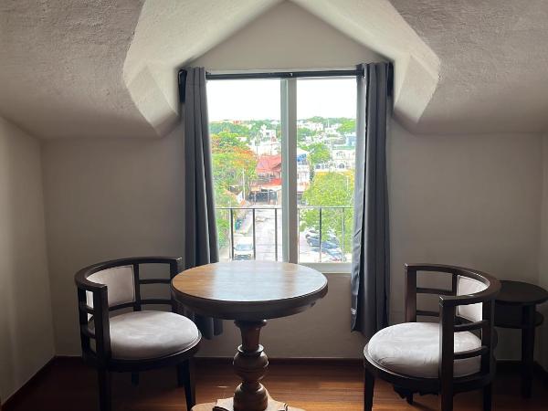 Xtabentun Hostal : photo 1 de la chambre chambre familiale avec salle de bains privative