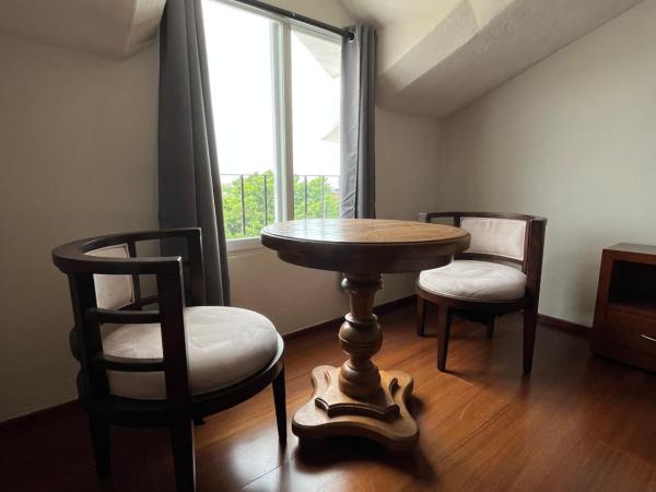 Xtabentun Hostal : photo 3 de la chambre chambre familiale avec salle de bains privative