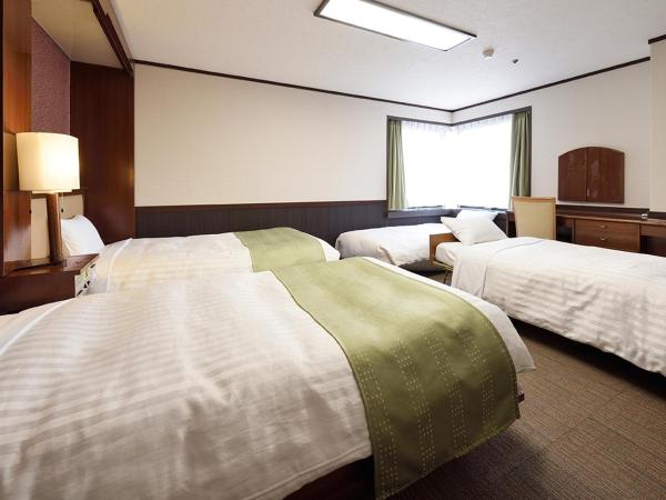 Belmont Hotel : photo 1 de la chambre chambre quadruple avec salle de bains privative