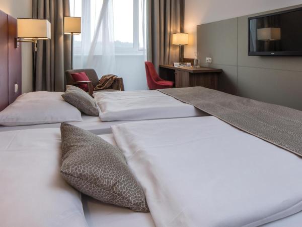 Austria Trend Hotel Europa Salzburg : photo 2 de la chambre chambre supérieure