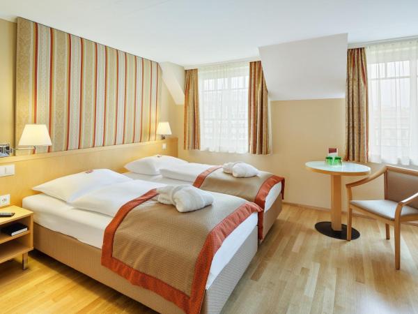 Austria Trend Hotel Ananas Wien : photo 1 de la chambre suite familiale