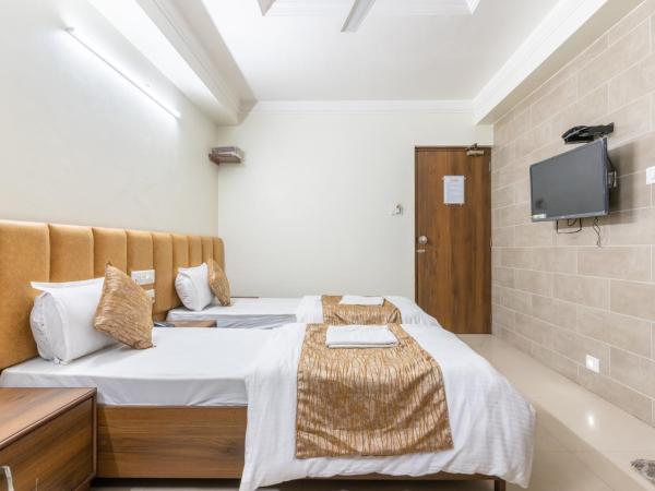 Hotel Sanmati : photo 4 de la chambre chambre deluxe