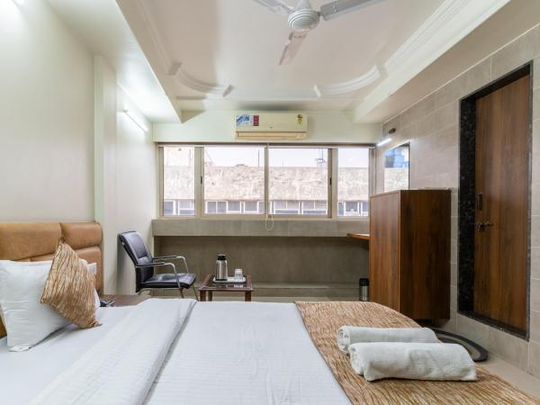 Hotel Sanmati : photo 1 de la chambre chambre deluxe