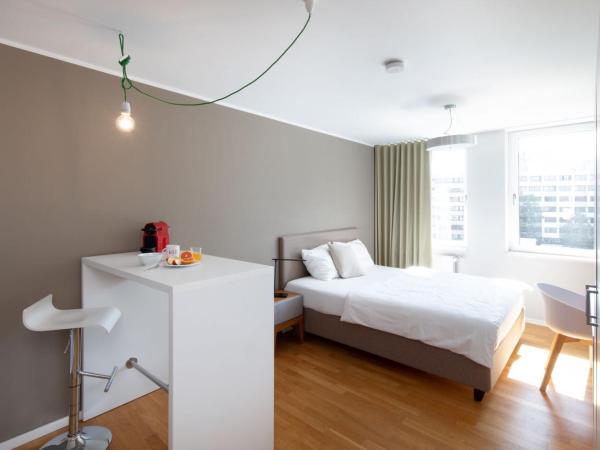 Brera Serviced Apartments Nürnberg : photo 4 de la chambre appartement confortable avec cuisine