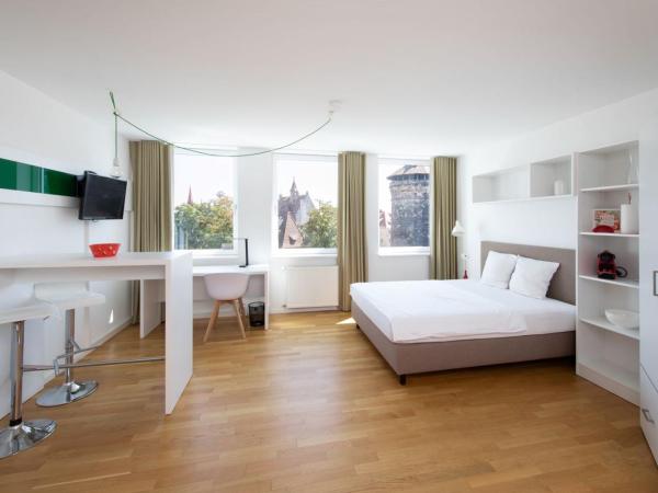 Brera Serviced Apartments Nürnberg : photo 5 de la chambre appartement confortable avec cuisine