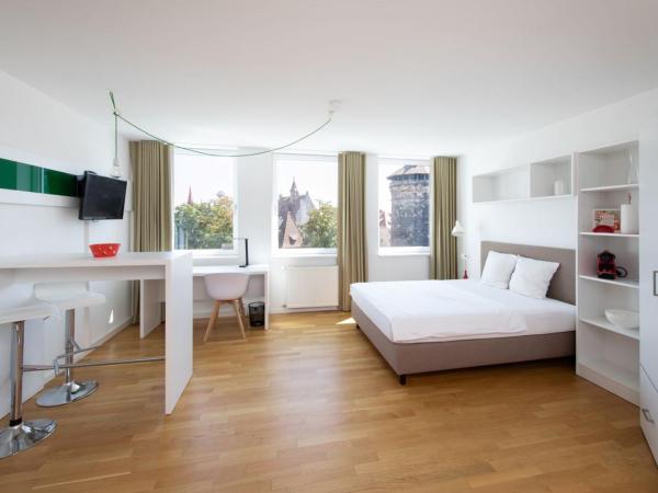 Brera Serviced Apartments Nürnberg : photo 2 de la chambre appartement confortable avec cuisine