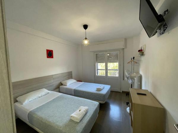 Pensión La Estrella : photo 6 de la chambre chambre lits jumeaux avec salle de bains privative