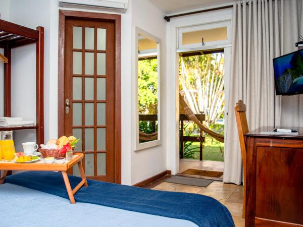 Villa Bella Ferradura : photo 1 de la chambre chambre triple - vue sur la piscine