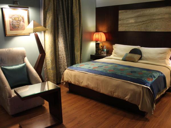 juSTa MG Road : photo 4 de la chambre suite