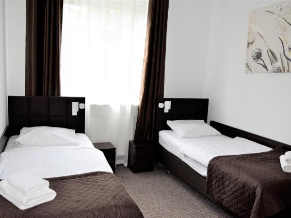 Villa Victoria : photo 3 de la chambre chambre lits jumeaux