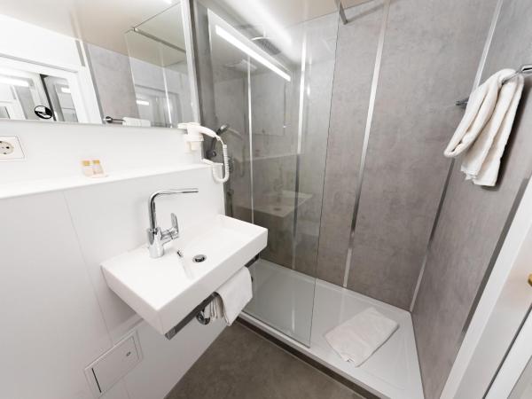 CityHotel Feuerbach : photo 3 de la chambre chambre simple avec douche 