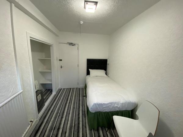 Aaran Central Guesthouse : photo 10 de la chambre chambre simple avec toilettes et douche communes