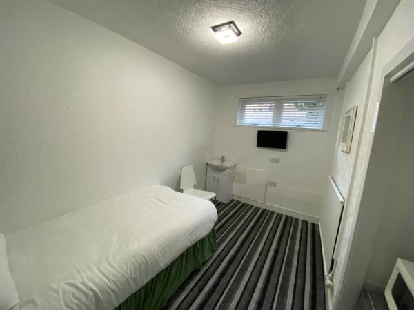 Aaran Central Guesthouse : photo 7 de la chambre chambre simple avec toilettes et douche communes