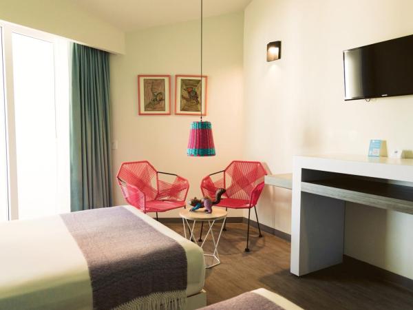 Fontan Ixtapa : photo 5 de la chambre chambre double deluxe - vue latérale sur mer