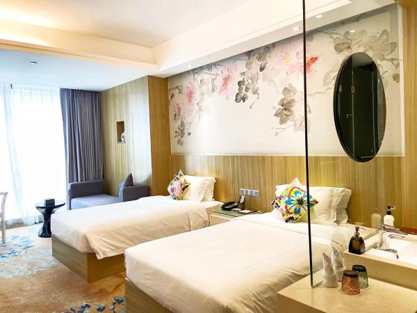 Paco Hotel Tаojin Metro Guangzhou-Free Shuttle Bus For Canton Fair : photo 4 de la chambre chambre lits jumeaux deluxe
