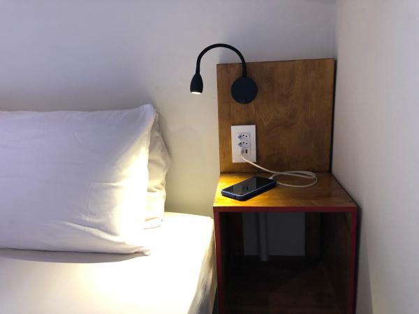 Mambembe Hostel : photo 3 de la chambre chambre double ou lits jumeaux - vue sur ville