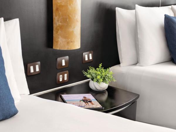Seadust Cancun Family Resort - All Inclusive : photo 6 de la chambre suite 2 lits doubles familiale 
