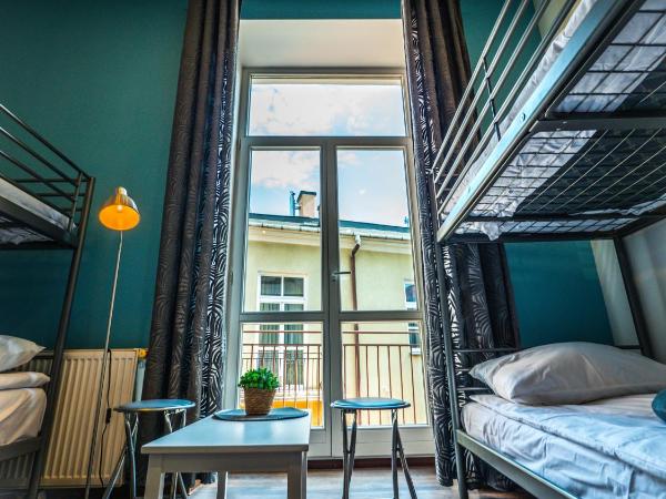 Hostel Pod Basztą : photo 6 de la chambre lit simple dans dortoir pour hommes