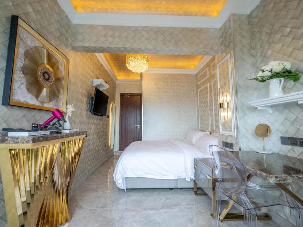 Ritz Residence @ Imago Loft B 7th Floor : photo 2 de la chambre chambre lit king-size avec balcon