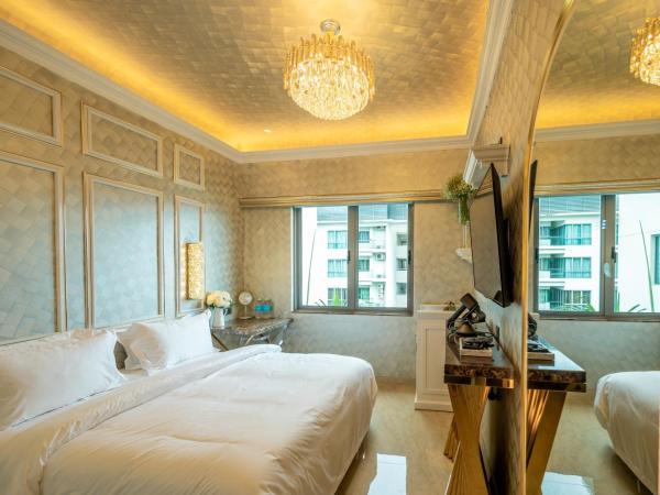 Ritz Residence @ Imago Loft B 7th Floor : photo 5 de la chambre chambre lit king-size - vue sur piscine 