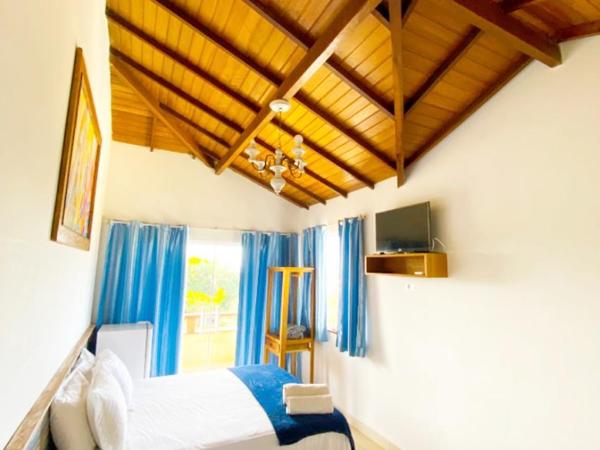 Pousada Preciosa : photo 4 de la chambre suite deluxe avec baignoire spa