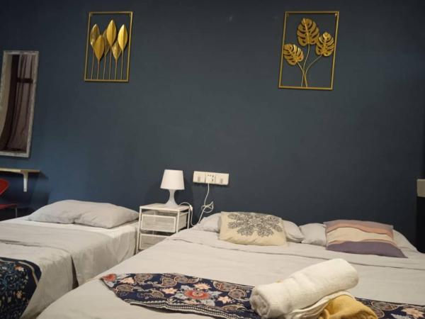 Wayton Express : photo 7 de la chambre chambre triple avec salle de bains commune