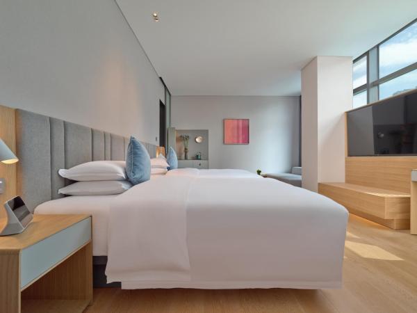 Pagoda Hotel Hangzhou Binjiang : photo 1 de la chambre chambre lits jumeaux deluxe