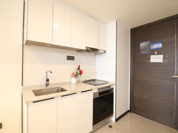 Xinghe Times Apartment - Shenzhen North Railway Station : photo 9 de la chambre executive loft two bedroom apartment