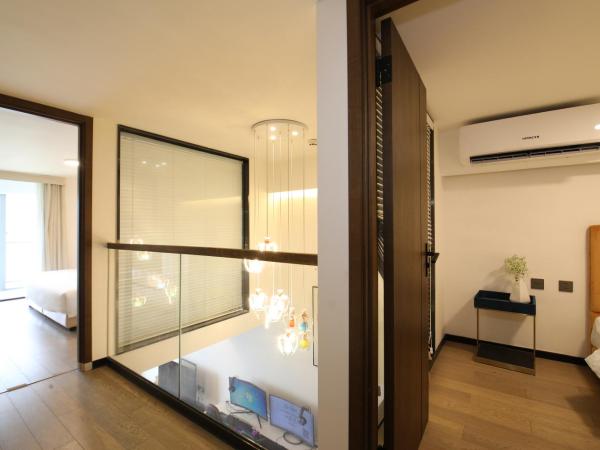 Xinghe Times Apartment - Shenzhen North Railway Station : photo 7 de la chambre executive loft two bedroom apartment