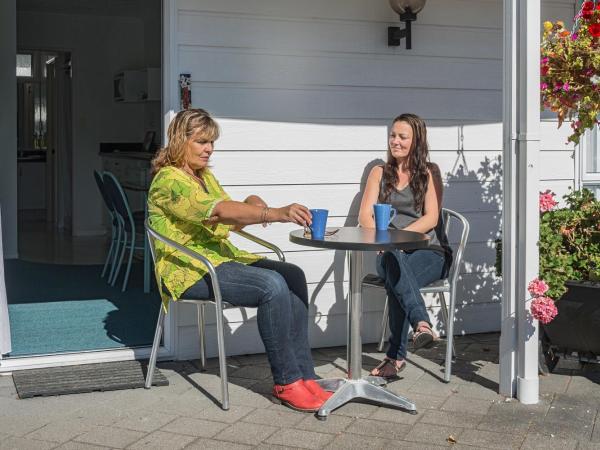 Palm Court Motor Inn : photo 4 de la chambre appartement 1 chambre avec jacuzzi