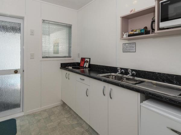 Palm Court Motor Inn : photo 3 de la chambre studio lits jumeaux avec bains à remous