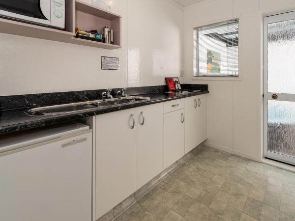 Palm Court Motor Inn : photo 10 de la chambre studio lits jumeaux avec bains à remous