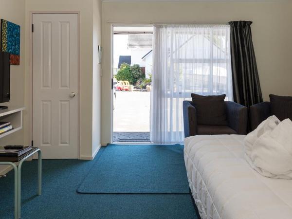 Palm Court Motor Inn : photo 10 de la chambre studio avec bain à remous