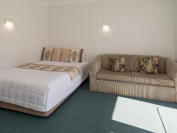 Palm Court Motor Inn : photo 10 de la chambre appartement 1 chambre avec jacuzzi