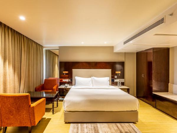 Citadel Sarovar Portico Bengaluru : photo 1 de la chambre chambre double deluxe