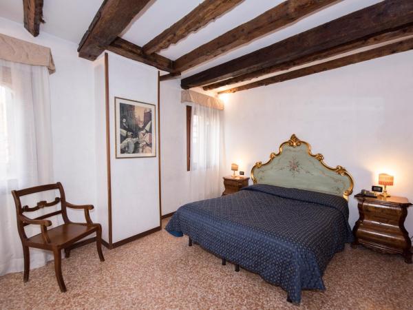 Hotel Guerrato : photo 1 de la chambre chambre triple
